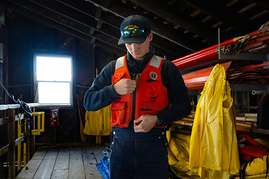 Man putting on a lifevest